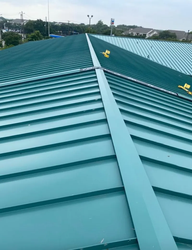 Green commercial metal roof ridge and valley for Metal Roof Repair in Winthrop Town