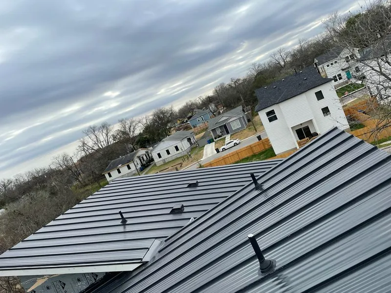 Standing seam metal roof panels with vents for Skylight Repair in Winthrop Town